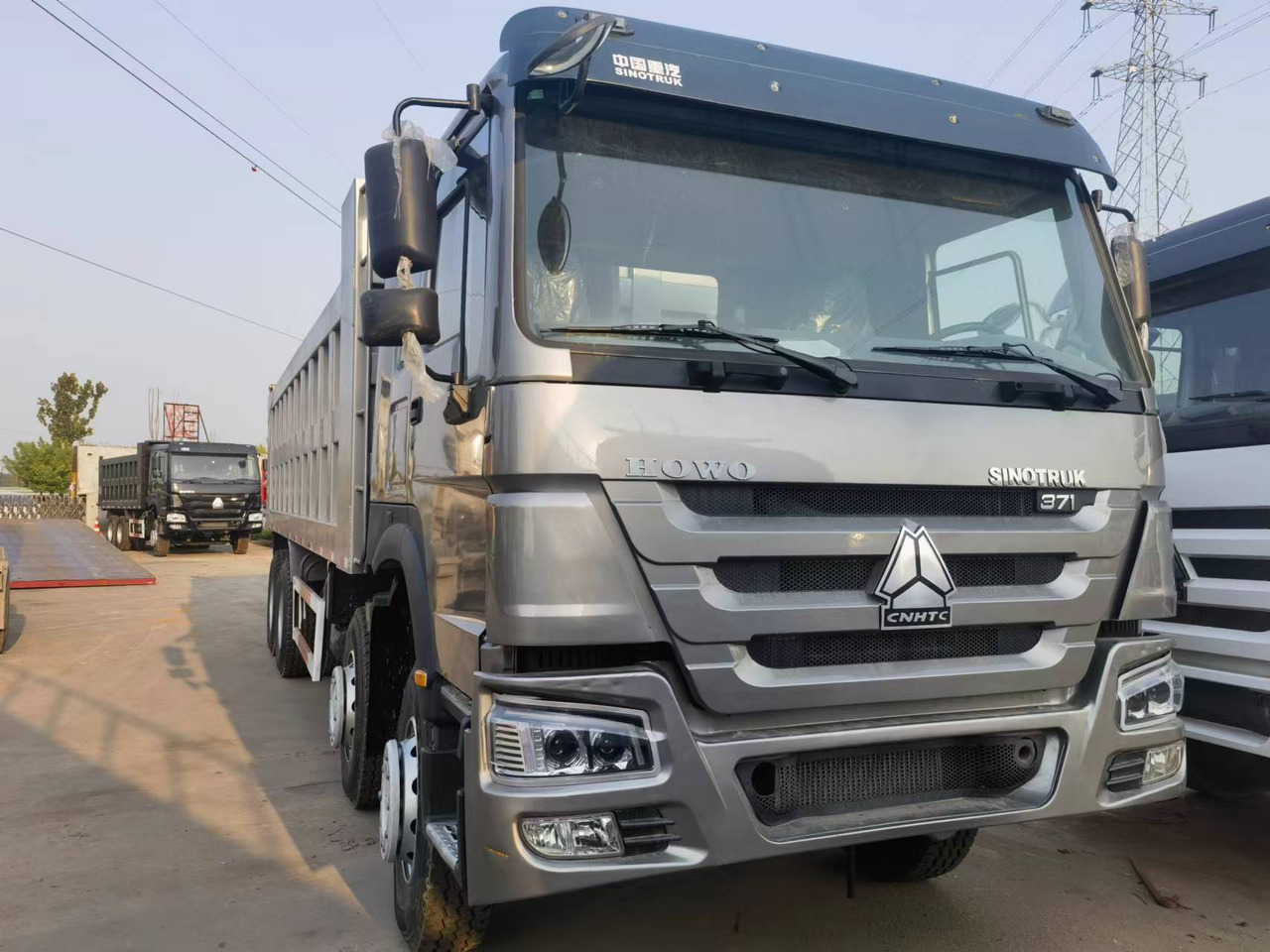 Sinotruk HOWO 371 8*4 Dump truck - Kipper vrachtwagen: afbeelding 1 Sinotruk HOWO 371 8*4 Dump truck - Kipper vrachtwagen: afbeelding 1