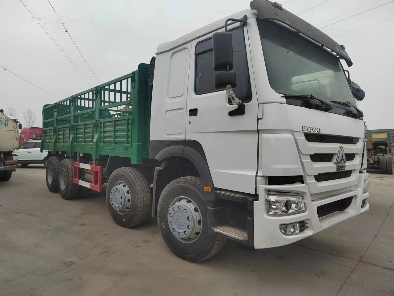 Sinotruk HOWO 8*4 Fence Truck - Vrachtwagen met open laadbak: afbeelding 3 Sinotruk HOWO 8*4 Fence Truck - Vrachtwagen met open laadbak: afbeelding 3
