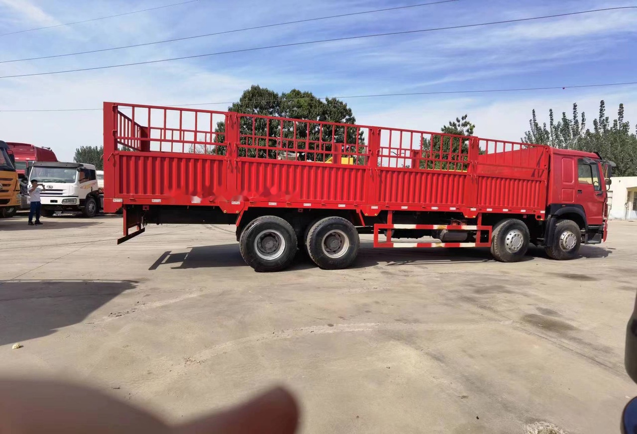 Sinotruk HOWO 8*4 Fence Truck - Minidumper: afbeelding 5 Sinotruk HOWO 8*4 Fence Truck - Minidumper: afbeelding 5