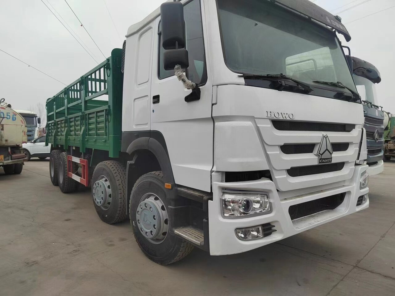 Sinotruk HOWO 8*4 Fence Truck - Vrachtwagen met open laadbak: afbeelding 2 Sinotruk HOWO 8*4 Fence Truck - Vrachtwagen met open laadbak: afbeelding 2