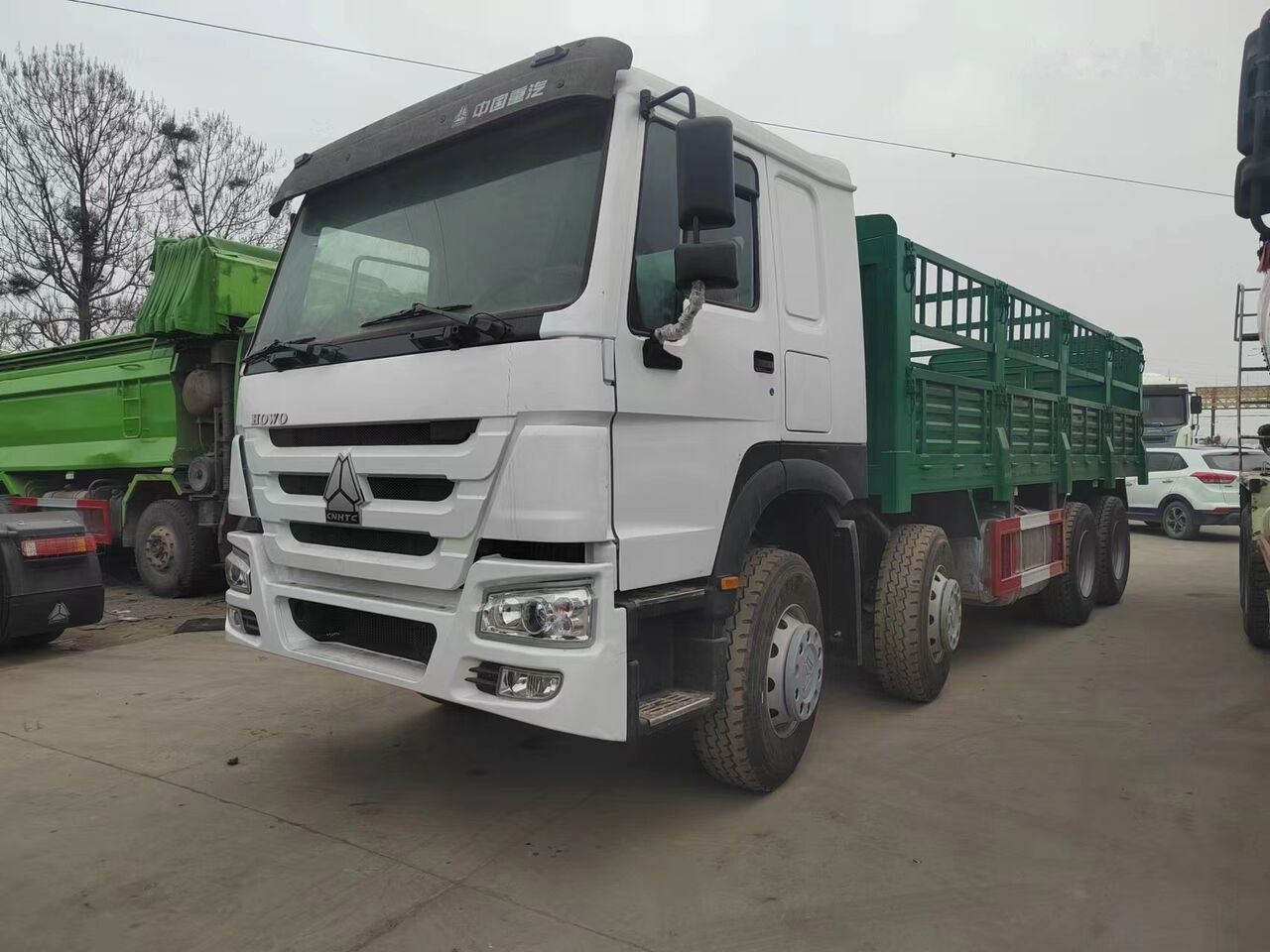 Sinotruk HOWO 8*4 Fence Truck - Vrachtwagen met open laadbak: afbeelding 1 Sinotruk HOWO 8*4 Fence Truck - Vrachtwagen met open laadbak: afbeelding 1