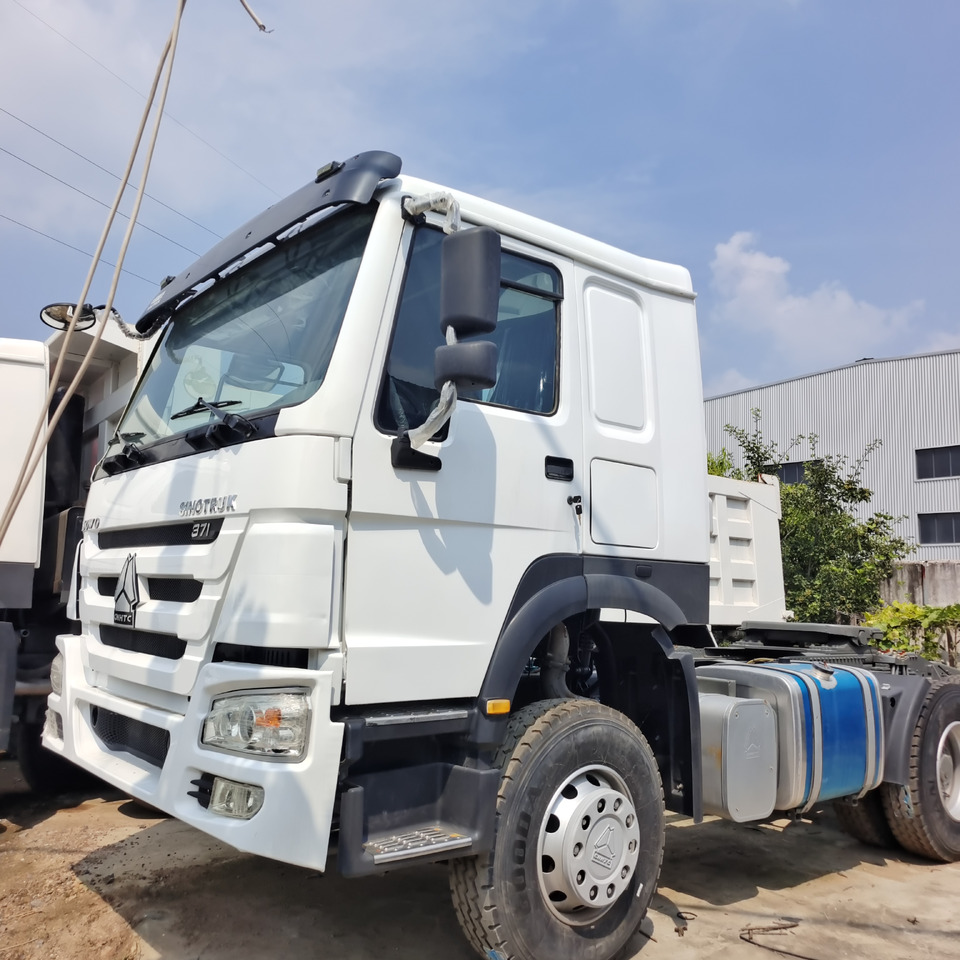 SINOTRUK HOWO 6*4 - Kipper aanhangwagen: afbeelding 4 SINOTRUK HOWO 6*4 - Kipper aanhangwagen: afbeelding 4