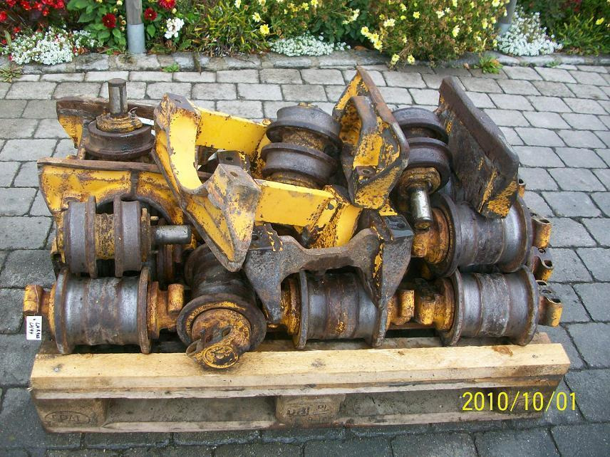 Liebherr R 902 Lit. - Rupsband - Rollen voor Bouwmachine: afbeelding 1 Liebherr R 902 Lit. - Rupsband - Rollen voor Bouwmachine: afbeelding 1