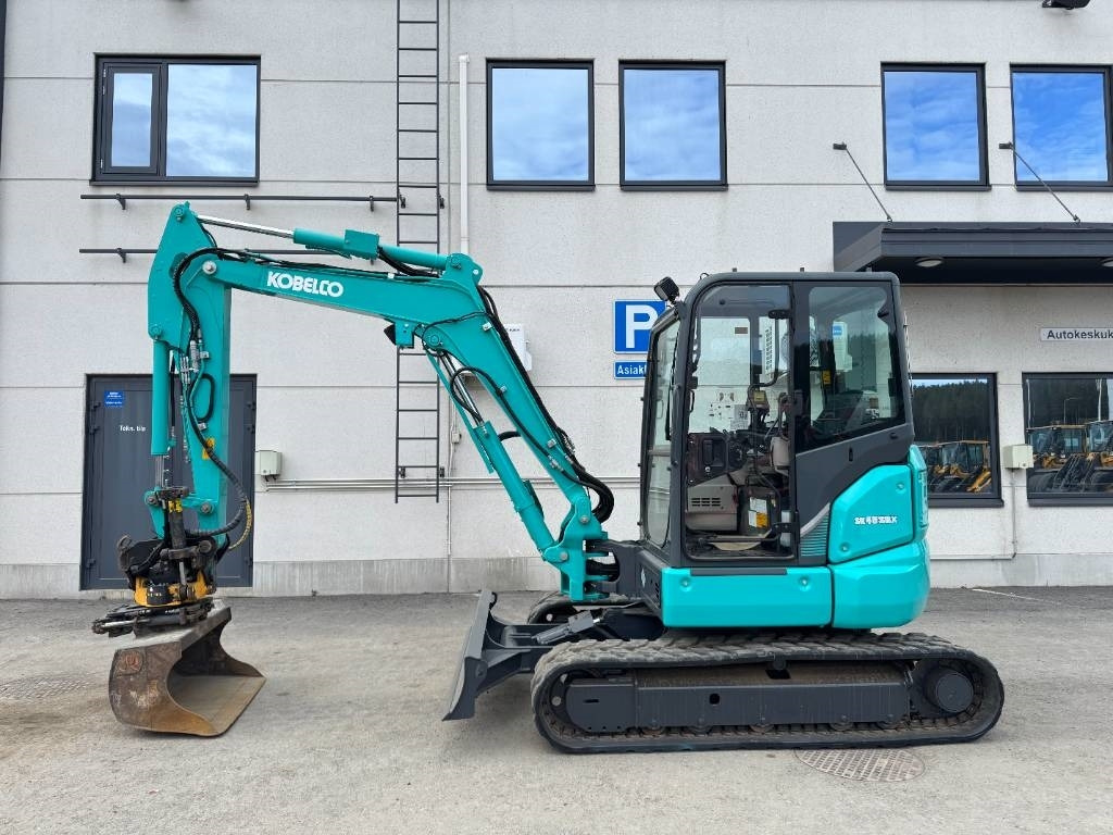 Kobelco SK45SRX-6 Pyörittäjä pihdeillä - Minigraafmachine: afbeelding 1 Kobelco SK45SRX-6 Pyörittäjä pihdeillä - Minigraafmachine: afbeelding 1