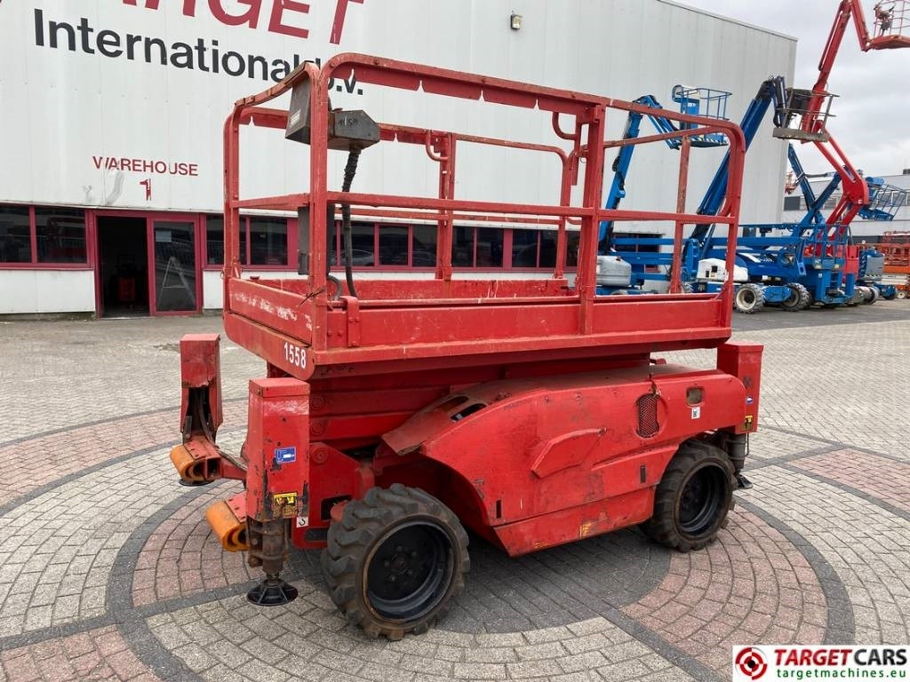 Haulotte Compact 10DX Diesel 4x4 Scissor Work Lift 1015cm - Schaarlift: afbeelding 1 Haulotte Compact 10DX Diesel 4x4 Scissor Work Lift 1015cm - Schaarlift: afbeelding 1