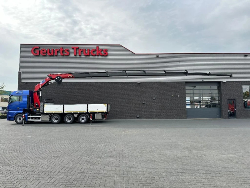 MAN TGX 33.560 8X4 TRIDEM + HMF 4020-K8 KRAAN/KRAN/CRANE/GRUA - Kraanwagen: afbeelding 1 MAN TGX 33.560 8X4 TRIDEM + HMF 4020-K8 KRAAN/KRAN/CRANE/GRUA - Kraanwagen: afbeelding 1