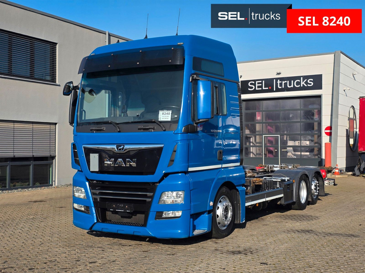 MAN TGX 24.460 6x2-2 LL-U / Ldbw / Standklima - Containertransporter/ Wissellaadbak vrachtwagen: afbeelding 1 MAN TGX 24.460 6x2-2 LL-U / Ldbw / Standklima - Containertransporter/ Wissellaadbak vrachtwagen: afbeelding 1