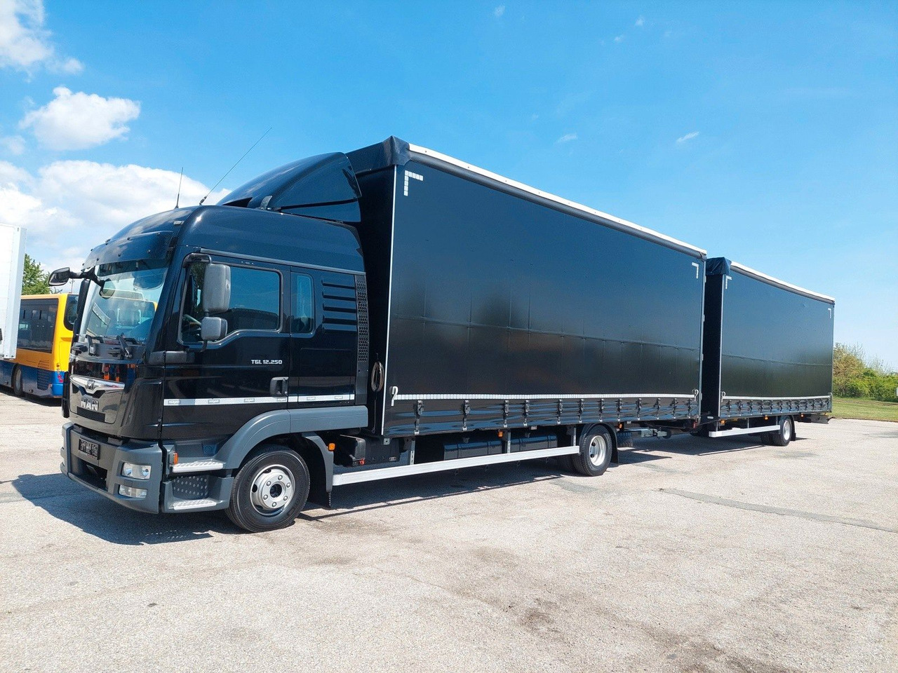 MAN TGL 12.250 BL 4x2 + Anhänger KONAR 38 Paletten - Schuifzeilen vrachtwagen: afbeelding 1 MAN TGL 12.250 BL 4x2 + Anhänger KONAR 38 Paletten - Schuifzeilen vrachtwagen: afbeelding 1