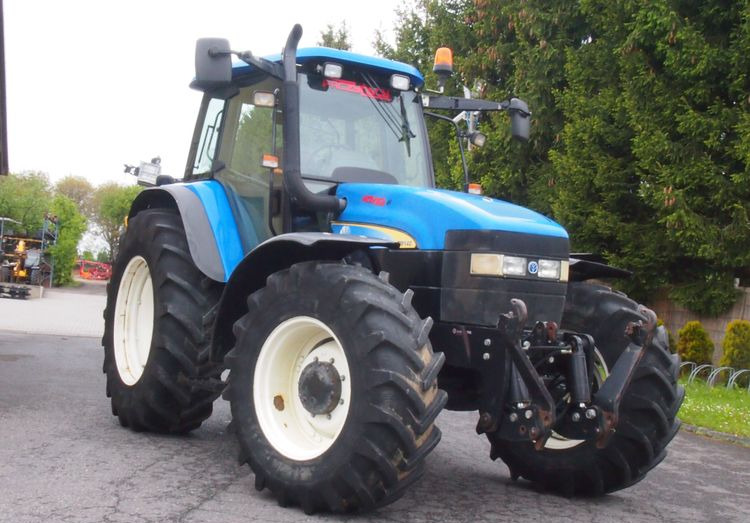 Ciągnik New Holland TM 140 2004 Przedni TUZ - Tractor: afbeelding 2 Ciągnik New Holland TM 140 2004 Przedni TUZ - Tractor: afbeelding 2
