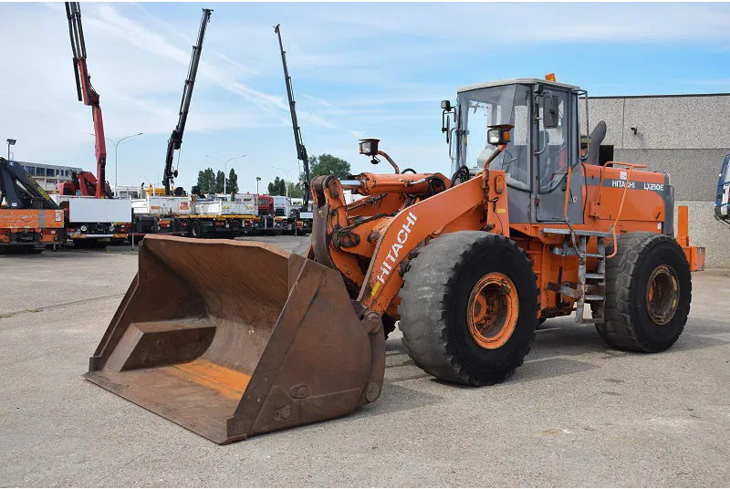 Hitachi LX 210E- stock id 59 - Wiellader: afbeelding 1 Hitachi LX 210E- stock id 59 - Wiellader: afbeelding 1