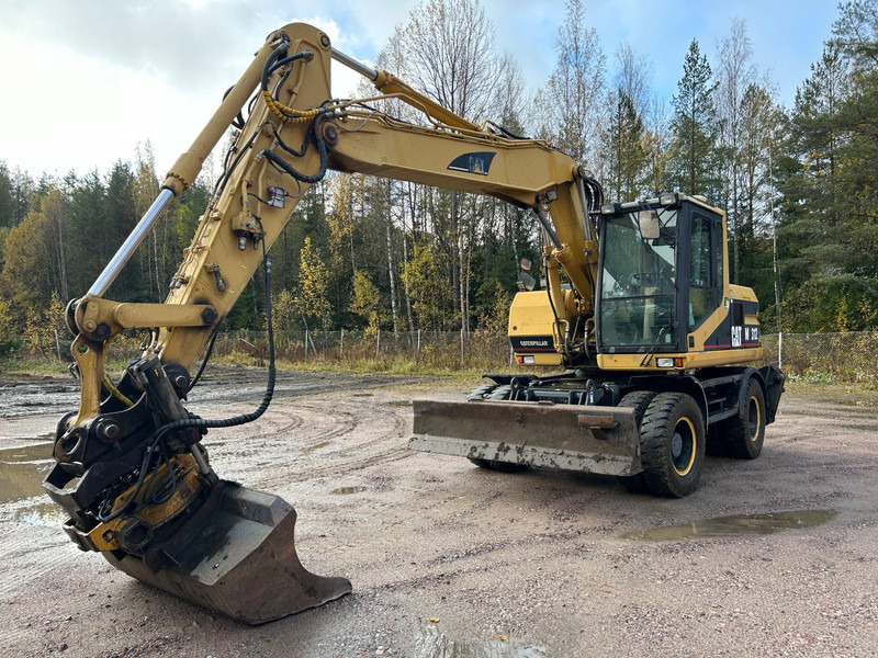 Caterpillar M312 Engcon EC20 tiltrotator - Mobiele graafmachine: afbeelding 1 Caterpillar M312 Engcon EC20 tiltrotator - Mobiele graafmachine: afbeelding 1