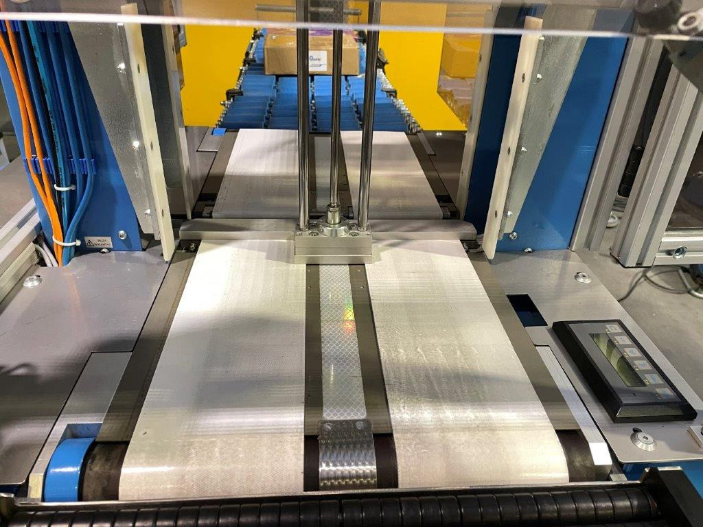 ATS Tanner UltraSonic US 2000-AB transit banding machine with pneumatic product hold-down and infeed roller table - Verpakkingsmachine: afbeelding 5 ATS Tanner UltraSonic US 2000-AB transit banding machine with pneumatic product hold-down and infeed roller table - Verpakkingsmachine: afbeelding 5