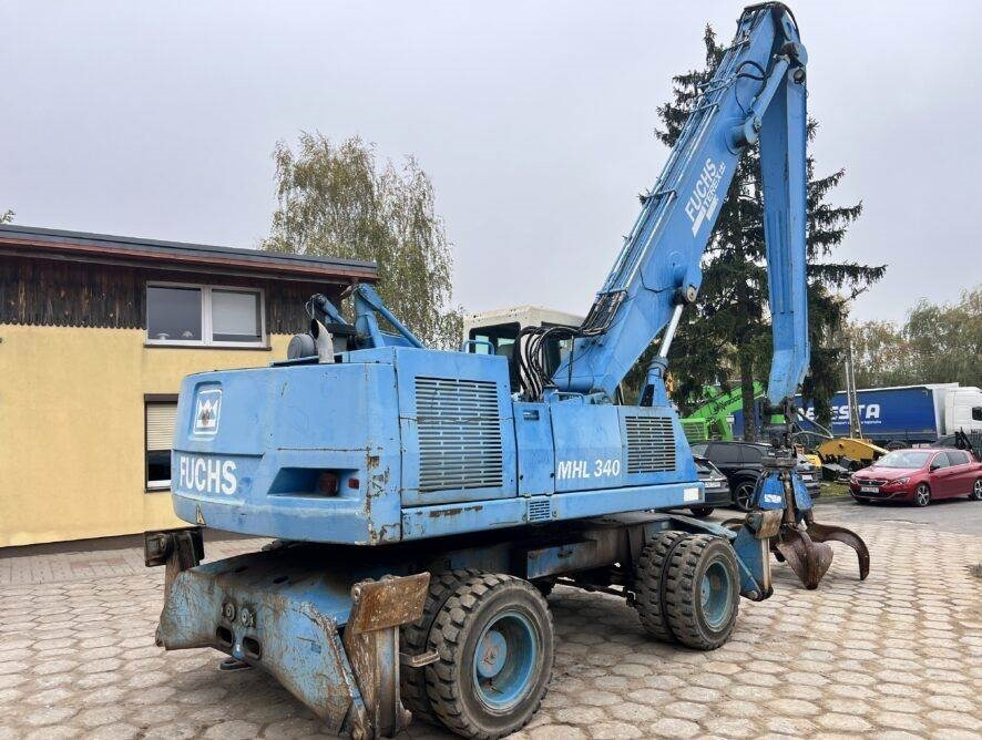 Fuchs MHL340 grab + generator - Overslagkraan: afbeelding 5 Fuchs MHL340 grab + generator - Overslagkraan: afbeelding 5