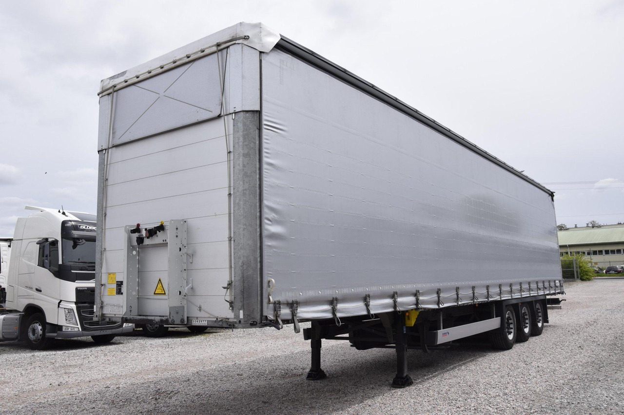 Schmitz Cargobull SCS24/L Varios - Schuifzeiloplegger: afbeelding 1 Schmitz Cargobull SCS24/L Varios - Schuifzeiloplegger: afbeelding 1