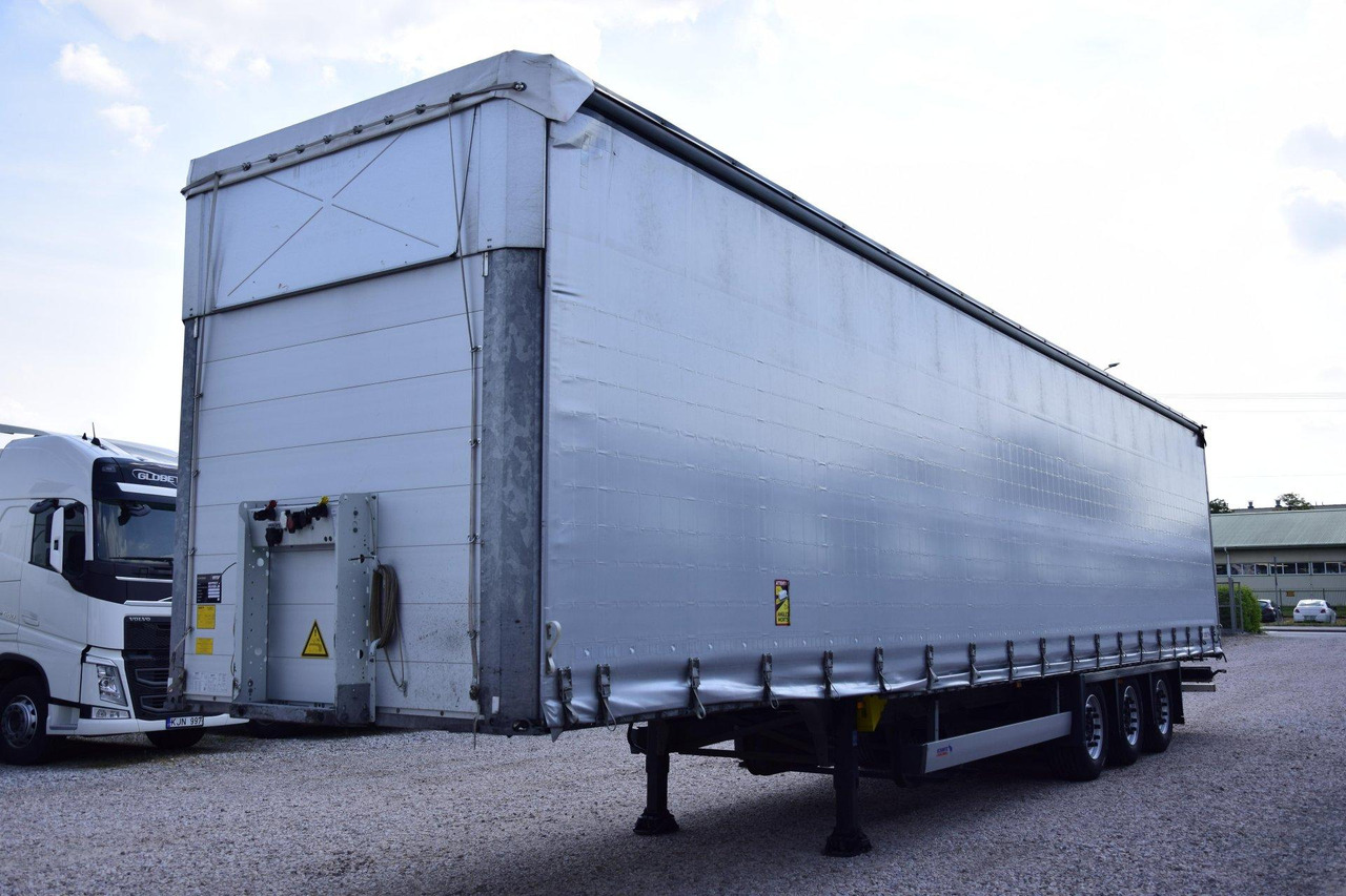 Schmitz Cargobull SCS24/L Varios - Schuifzeiloplegger: afbeelding 1 Schmitz Cargobull SCS24/L Varios - Schuifzeiloplegger: afbeelding 1