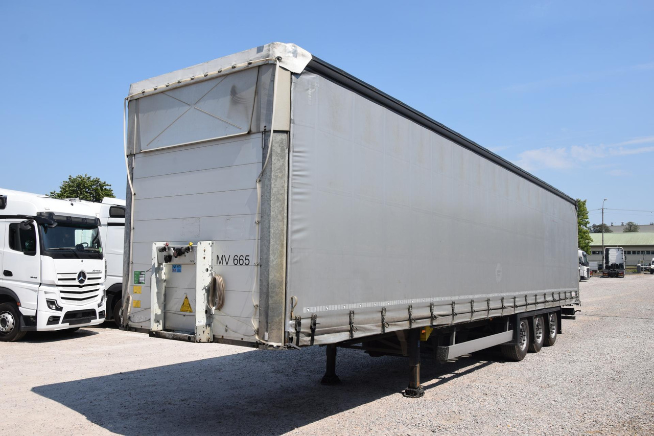 Schmitz Cargobull SCS24/L Varios - Schuifzeiloplegger: afbeelding 1 Schmitz Cargobull SCS24/L Varios - Schuifzeiloplegger: afbeelding 1