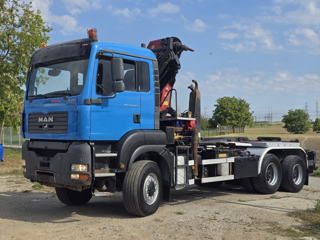 MAN TGA 33.430 6X6 / HMF 1823 K3+REM.CON./ HOOK SYSTEM - Haakarmsysteem vrachtwagen, Kraanwagen: afbeelding 3 MAN TGA 33.430 6X6 / HMF 1823 K3+REM.CON./ HOOK SYSTEM - Haakarmsysteem vrachtwagen, Kraanwagen: afbeelding 3