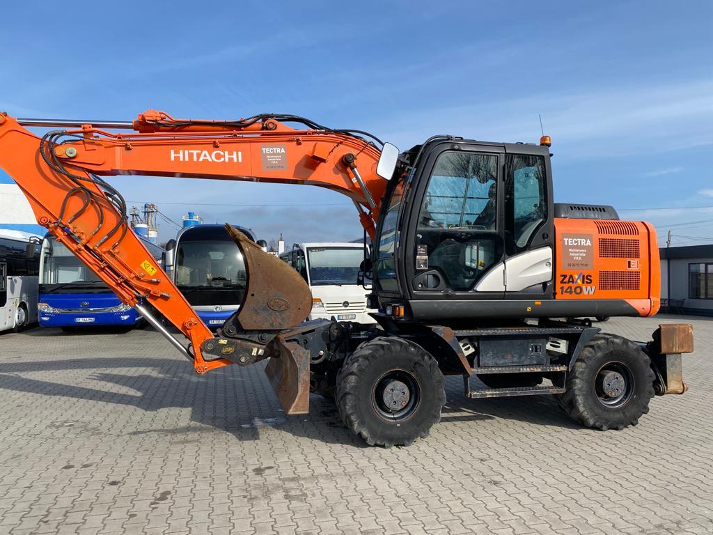 HITACHI ZX 140 W / IMPORTED FROM FRANCE / 3 300 MTH / 122 KM - Mobiele graafmachine: afbeelding 1 HITACHI ZX 140 W / IMPORTED FROM FRANCE / 3 300 MTH / 122 KM - Mobiele graafmachine: afbeelding 1