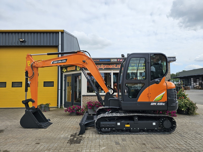 Develon DX60E-10N - Minigraafmachine: afbeelding 1 Develon DX60E-10N - Minigraafmachine: afbeelding 1
