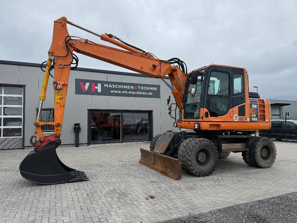 Komatsu PW 148-8 - Mobiele graafmachine: afbeelding 1 Komatsu PW 148-8 - Mobiele graafmachine: afbeelding 1