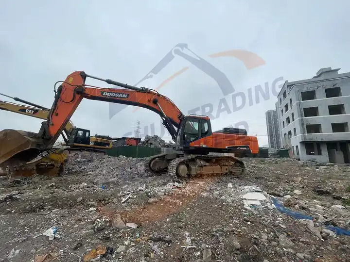 Low price Used Doosan excavator DX520LC-9C in good condition for sale - Rupsgraafmachine: afbeelding 4 Low price Used Doosan excavator DX520LC-9C in good condition for sale - Rupsgraafmachine: afbeelding 4