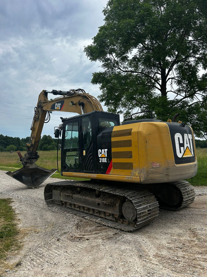 CATERPILLAR 318 E - Rupsgraafmachine: afbeelding 1 CATERPILLAR 318 E - Rupsgraafmachine: afbeelding 1