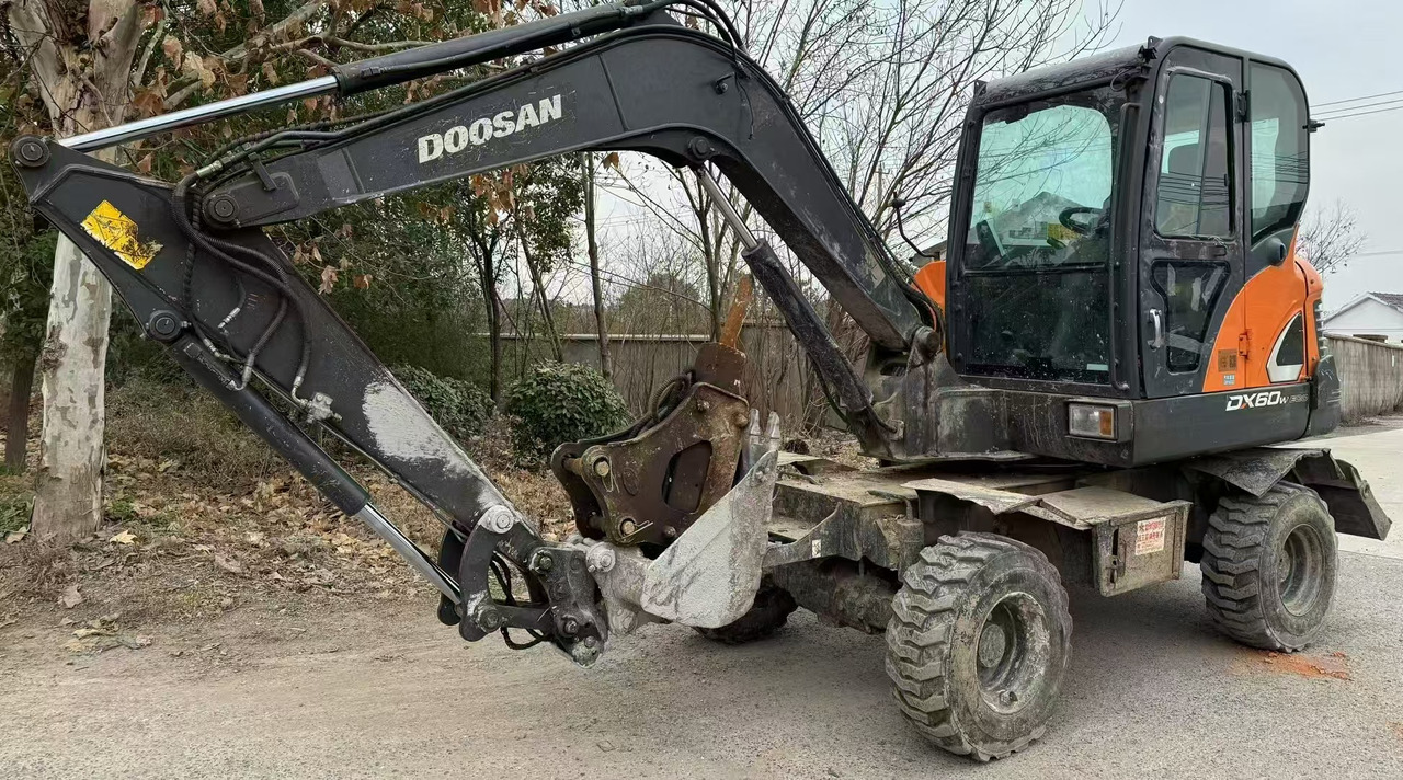Doosan DX60 - Mobiele graafmachine: afbeelding 1 Doosan DX60 - Mobiele graafmachine: afbeelding 1