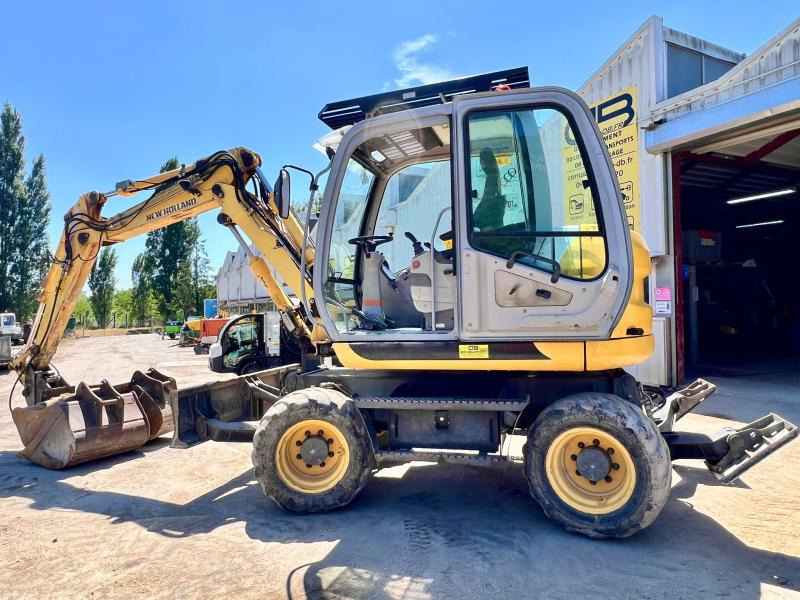 New Holland MH 2.6 PELLE A PNEUS 10T - Mobiele graafmachine: afbeelding 2 New Holland MH 2.6 PELLE A PNEUS 10T - Mobiele graafmachine: afbeelding 2