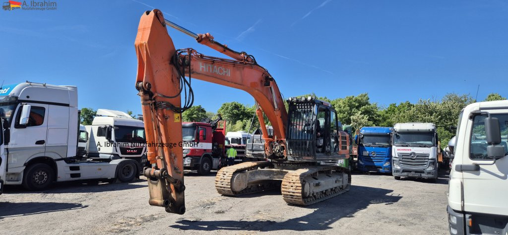 Hitachi ZX 300LCN-6 Schaden imHeckbereich, läuft aber !! 8125 h - Rupsgraafmachine: afbeelding 1 Hitachi ZX 300LCN-6 Schaden imHeckbereich, läuft aber !! 8125 h - Rupsgraafmachine: afbeelding 1