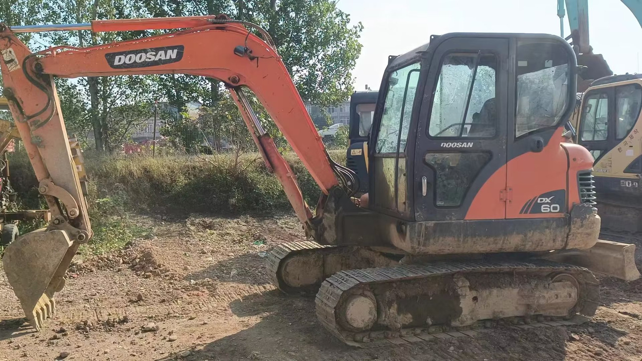 DOOSAN dx60 - Minigraafmachine: afbeelding 1 DOOSAN dx60 - Minigraafmachine: afbeelding 1