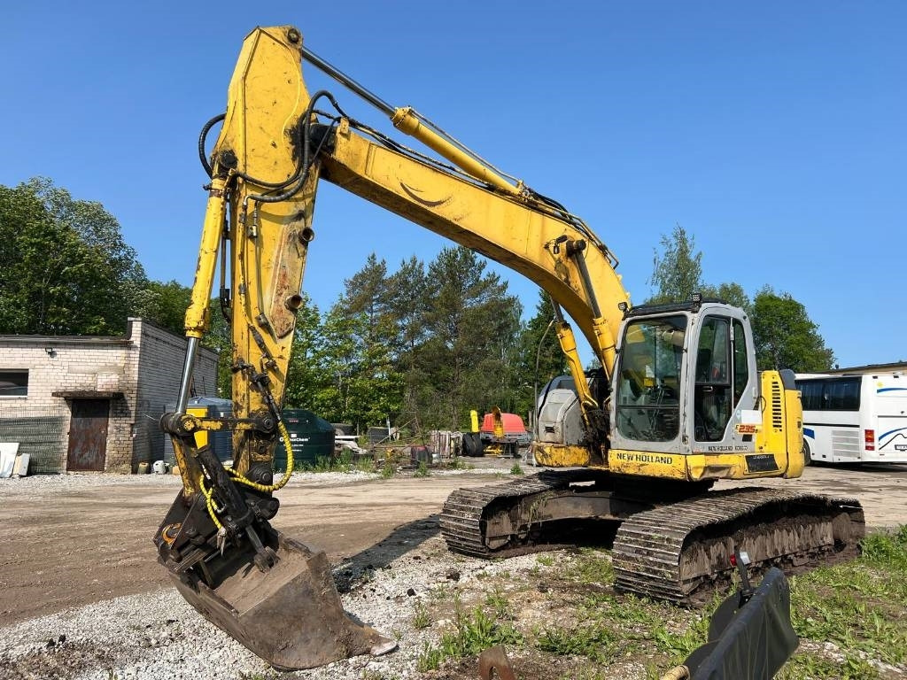 NEW HOLLAND KOBELCO E235BSRLC-2 - Rupsgraafmachine: afbeelding 1 NEW HOLLAND KOBELCO E235BSRLC-2 - Rupsgraafmachine: afbeelding 1