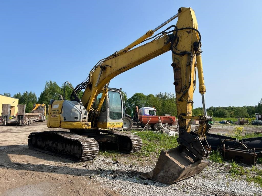 NEW HOLLAND KOBELCO E235BSRLC-2 - Rupsgraafmachine: afbeelding 2 NEW HOLLAND KOBELCO E235BSRLC-2 - Rupsgraafmachine: afbeelding 2