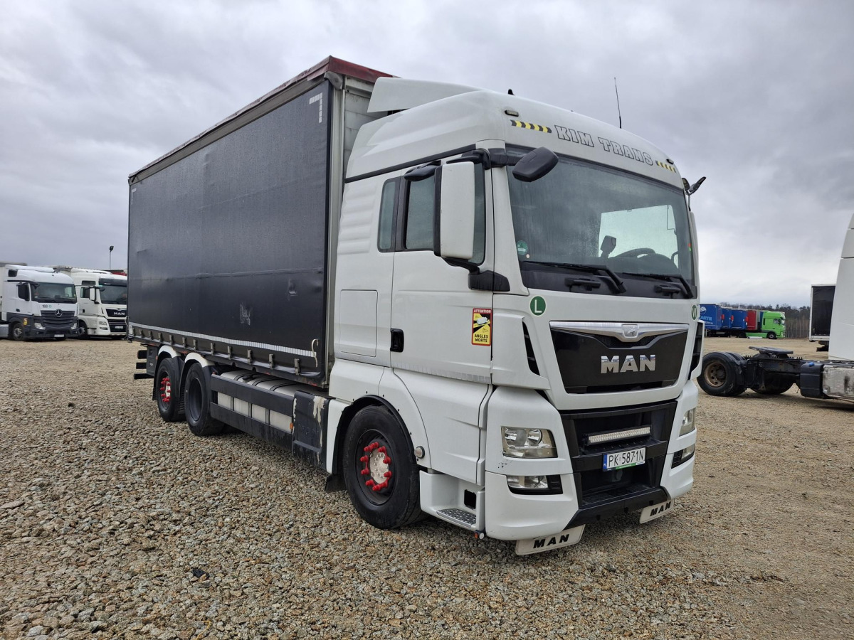 MAN TGX SOLÓWKA - Schuifzeilen vrachtwagen: afbeelding 1 MAN TGX SOLÓWKA - Schuifzeilen vrachtwagen: afbeelding 1