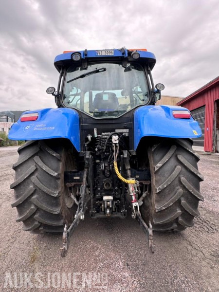 2012 New Holland T6050 med Trima +4.1P frontlaster og panser beskytter - 40 km/t - Tractor: afbeelding 5 2012 New Holland T6050 med Trima +4.1P frontlaster og panser beskytter - 40 km/t - Tractor: afbeelding 5