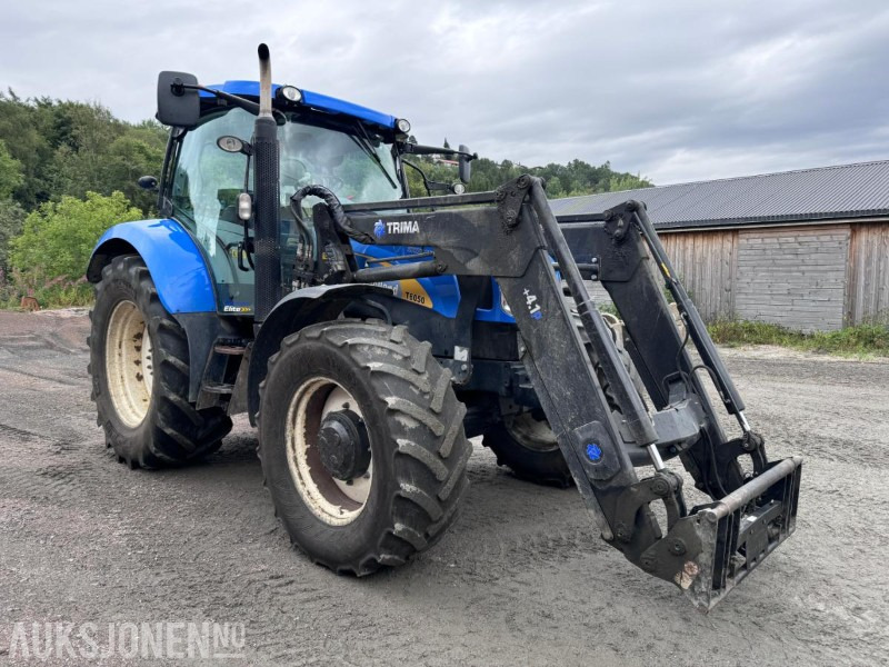 2012 New Holland T6050 med Trima +4.1P frontlaster og panser beskytter - 40 km/t - Tractor: afbeelding 3 2012 New Holland T6050 med Trima +4.1P frontlaster og panser beskytter - 40 km/t - Tractor: afbeelding 3