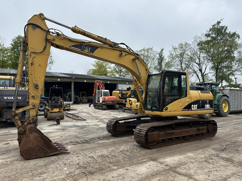 Caterpillar 318 CL (not 320CL - 325CL) - Rupsgraafmachine: afbeelding 1 Caterpillar 318 CL (not 320CL - 325CL) - Rupsgraafmachine: afbeelding 1