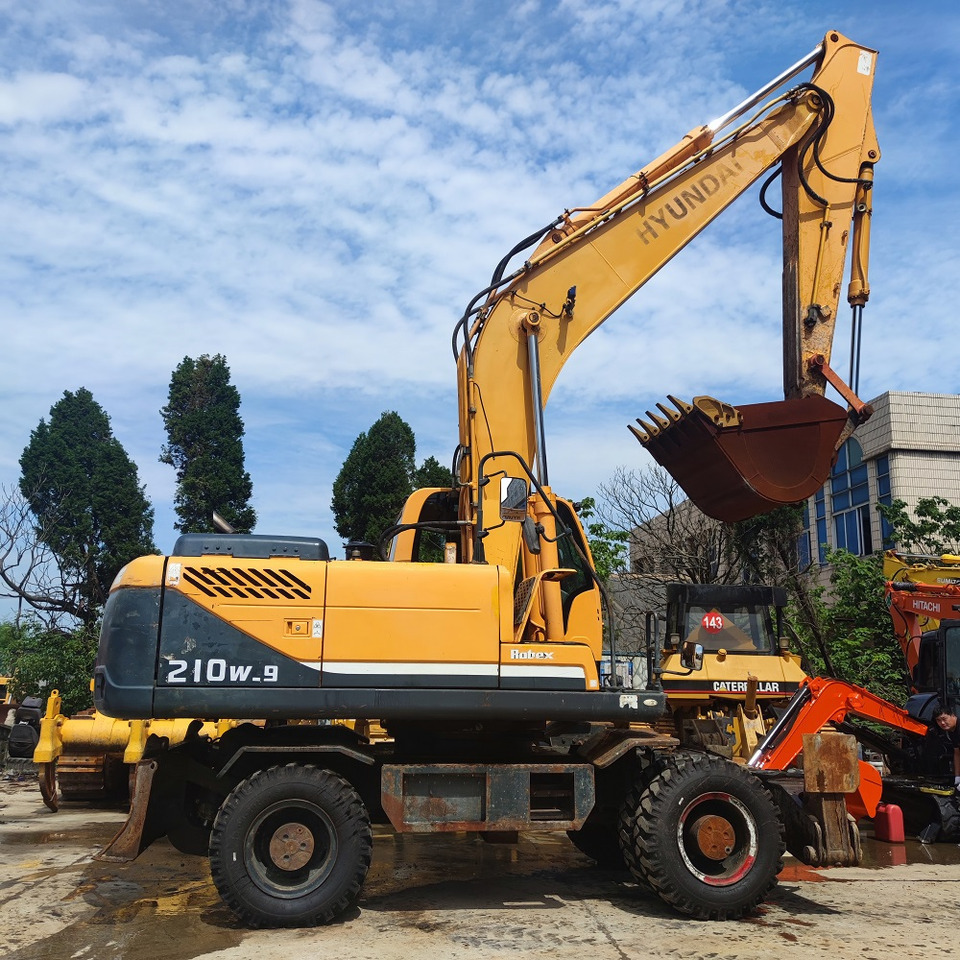 Hyundai 210w-9 wheel excavator - Mobiele graafmachine: afbeelding 1 Hyundai 210w-9 wheel excavator - Mobiele graafmachine: afbeelding 1