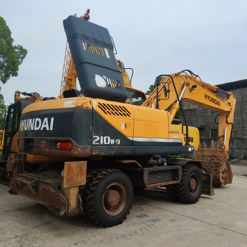 Hyundai 210w-9 wheel excavator - Mobiele graafmachine: afbeelding 1 Hyundai 210w-9 wheel excavator - Mobiele graafmachine: afbeelding 1