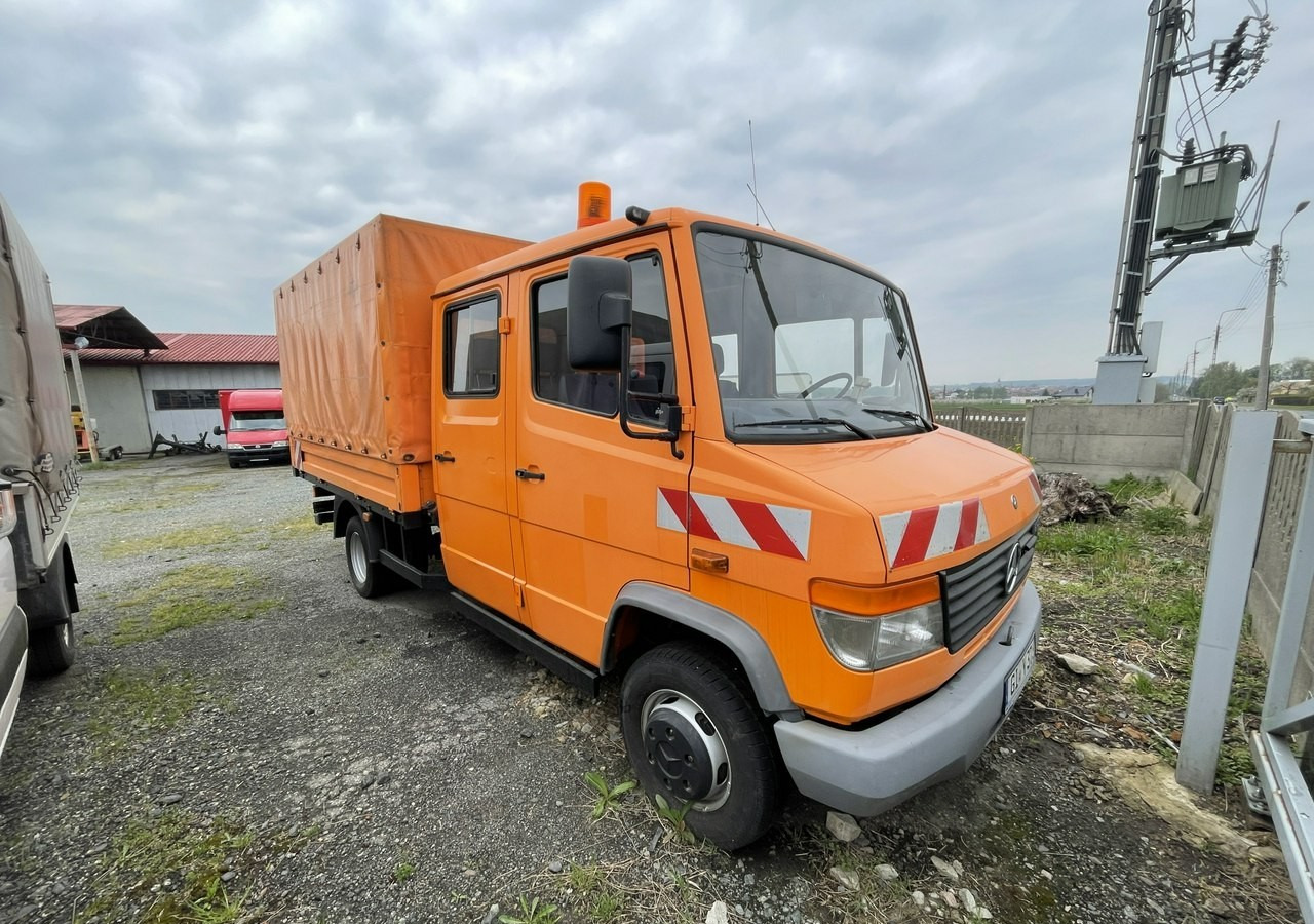 Mercedes-Benz Inny Mercedes-Benz Vario 614 Brygadówka skrzynia plandeka 6-oso doka dokka 2004 - Schuifzeilen vrachtwagen: afbeelding 1 Mercedes-Benz Inny Mercedes-Benz Vario 614 Brygadówka skrzynia plandeka 6-oso doka dokka 2004 - Schuifzeilen vrachtwagen: afbeelding 1