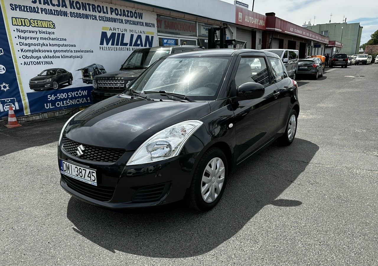 Suzuki Swift V Suzuki Swift 1.2-94KM Klima Model 2012 - Hatchback: afbeelding 2 Suzuki Swift V Suzuki Swift 1.2-94KM Klima Model 2012 - Hatchback: afbeelding 2