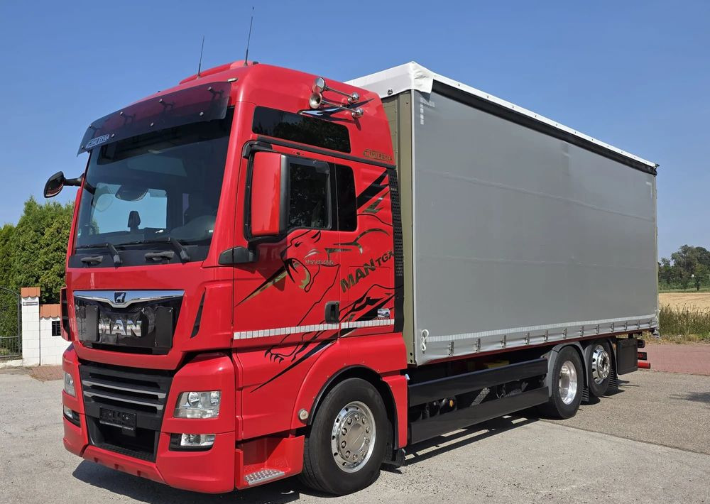 MAN TGX 26.500 / ALUMINIOWE FELGI / LIFT / 6X2 / KLIMA POSTOJOWA / 18PALET / E6 / FIRANKA / 17 TON ŁADOWNOŚĆ / WINDA / NISKI PRZEBIEG / JEDEN WŁAŚCICIEL / PODWIESZANA OŚ - Schuifzeilen vrachtwagen: afbeelding 1 MAN TGX 26.500 / ALUMINIOWE FELGI / LIFT / 6X2 / KLIMA POSTOJOWA / 18PALET / E6 / FIRANKA / 17 TON ŁADOWNOŚĆ / WINDA / NISKI PRZEBIEG / JEDEN WŁAŚCICIEL / PODWIESZANA OŚ - Schuifzeilen vrachtwagen: afbeelding 1