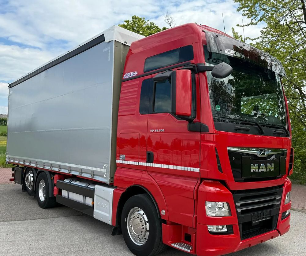 MAN TGX 26.500 / LIFT / 6X2 / KLIMA POSTOJOWA / 18PALET / E6 / FIRANKA / 18 TON ŁADOWNOŚĆ / WINDA / NISKI PRZEBIEG / JEDEN WŁAŚCICIEL / PODWIESZANA OŚ - Schuifzeilen vrachtwagen: afbeelding 2 MAN TGX 26.500 / LIFT / 6X2 / KLIMA POSTOJOWA / 18PALET / E6 / FIRANKA / 18 TON ŁADOWNOŚĆ / WINDA / NISKI PRZEBIEG / JEDEN WŁAŚCICIEL / PODWIESZANA OŚ - Schuifzeilen vrachtwagen: afbeelding 2