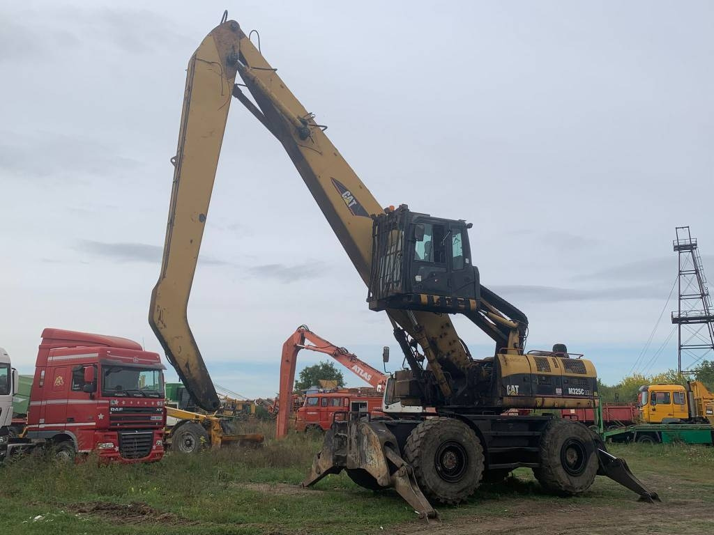 CAT M 325 C L MH  - Overslagkraan: afbeelding 1 CAT M 325 C L MH  - Overslagkraan: afbeelding 1