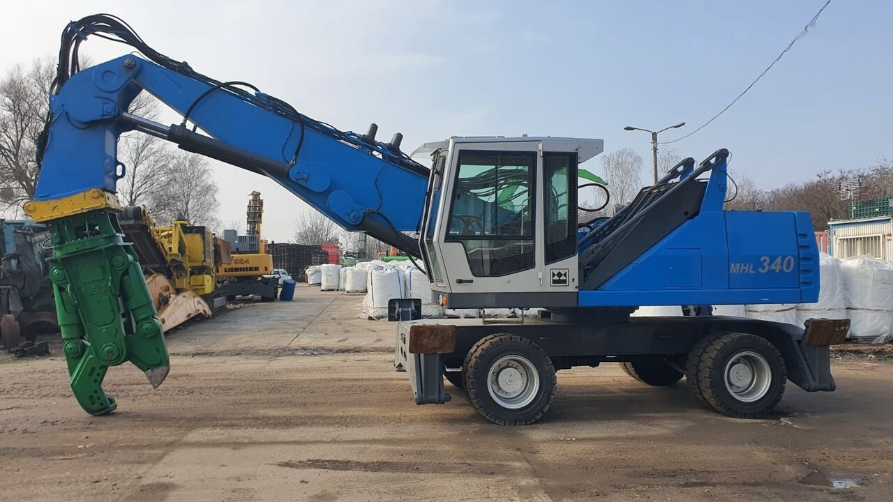 Fuchs MHL 340D FQC + LST 3to shear - Overslagkraan: afbeelding 1 Fuchs MHL 340D FQC + LST 3to shear - Overslagkraan: afbeelding 1