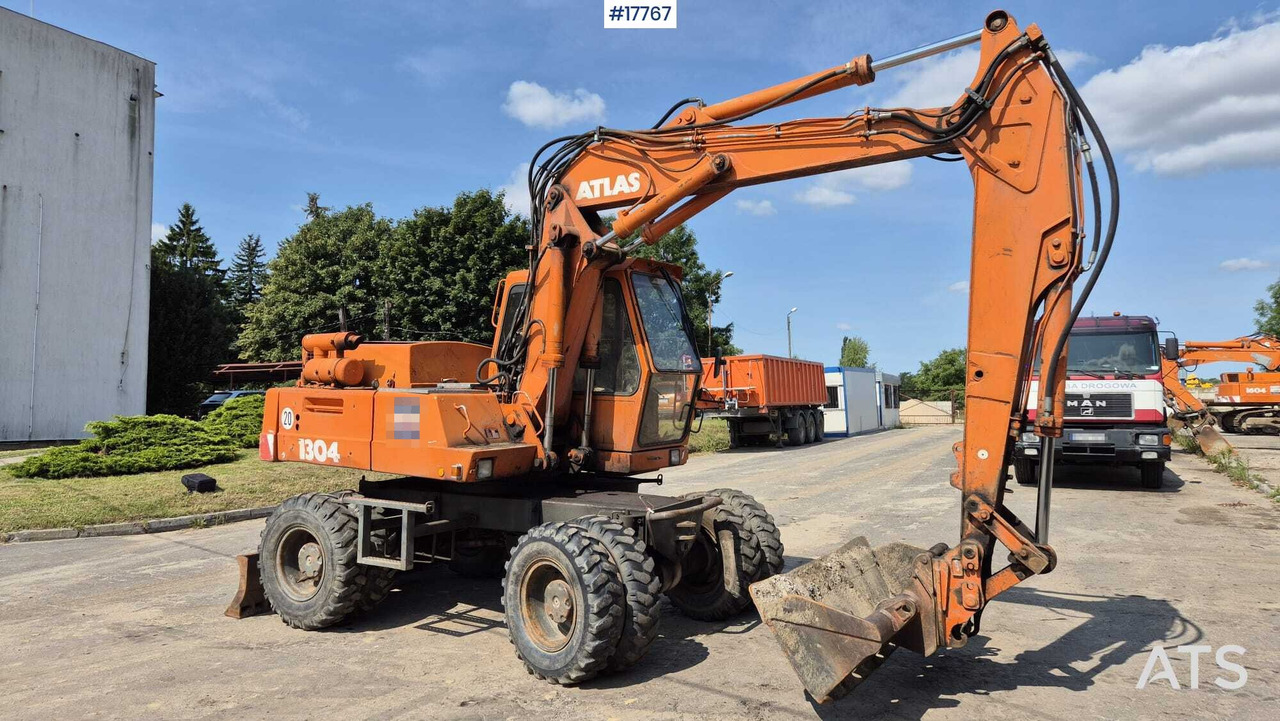 ATLAS 1304 wheeled excavator (1993) - Mobiele graafmachine: afbeelding 1 ATLAS 1304 wheeled excavator (1993) - Mobiele graafmachine: afbeelding 1