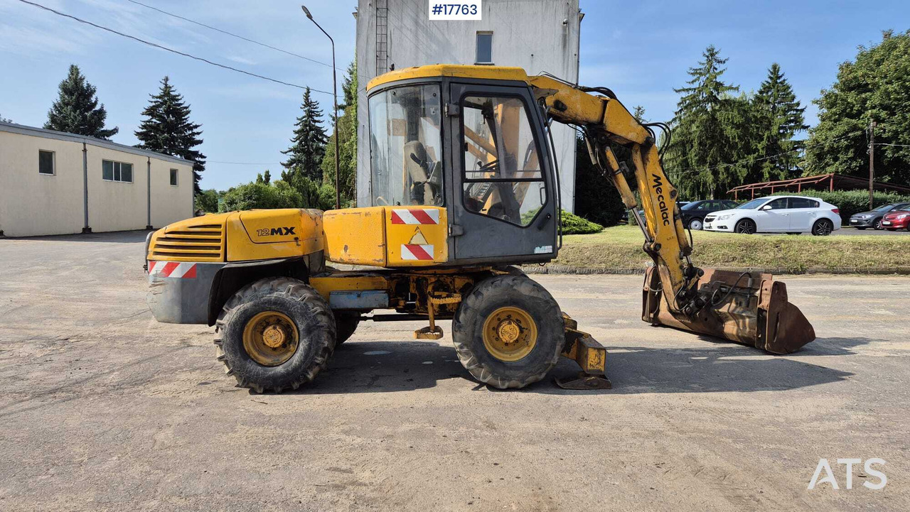 MECALAC 12MX wheeled excavator (1996) - Mobiele graafmachine: afbeelding 4 MECALAC 12MX wheeled excavator (1996) - Mobiele graafmachine: afbeelding 4
