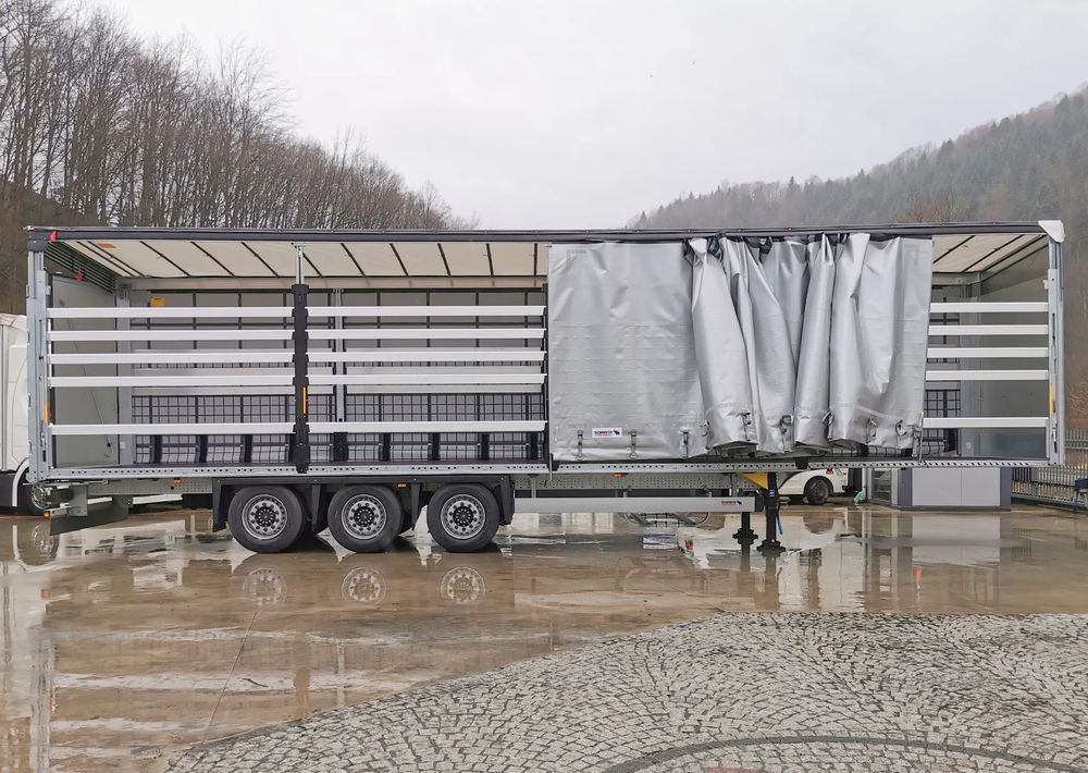 Schmitz Cargobull MEGA VARIOS - Schuifzeiloplegger: afbeelding 5 Schmitz Cargobull MEGA VARIOS - Schuifzeiloplegger: afbeelding 5