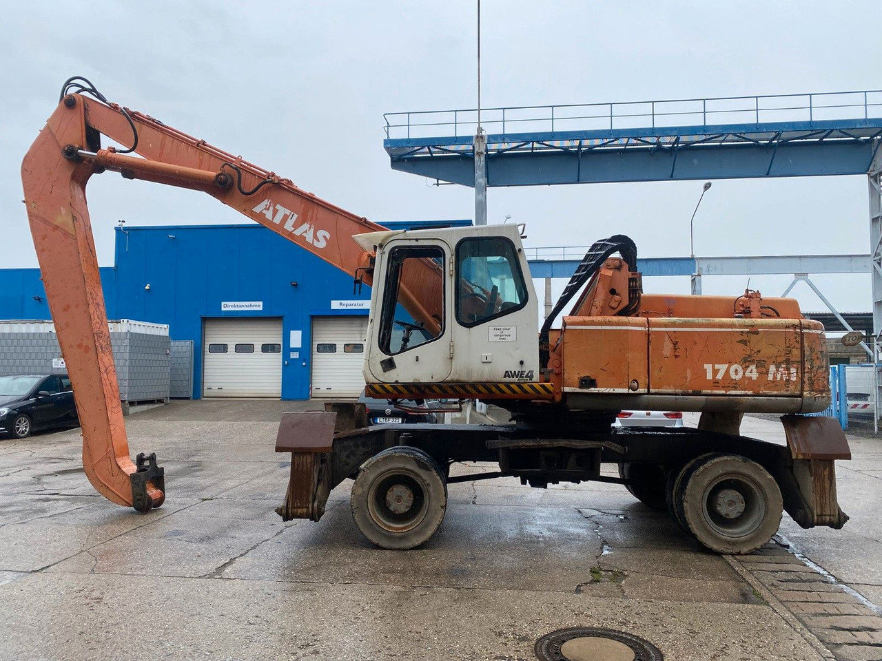 Atlas 1704 MI mit Greifer Umschlagbagger Lang - Mobiele graafmachine: afbeelding 1 Atlas 1704 MI mit Greifer Umschlagbagger Lang - Mobiele graafmachine: afbeelding 1