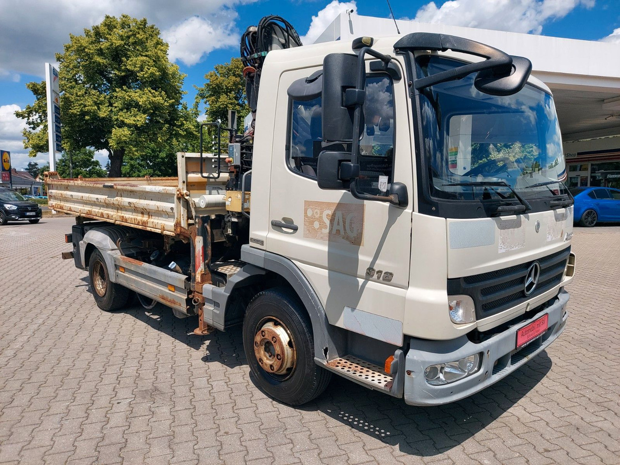 Mercedes-Benz Atego 2 918 3-Seiten Kipper KRAN TEREX 65.2 - Kipper vrachtwagen, Kraanwagen: afbeelding 1 Mercedes-Benz Atego 2 918 3-Seiten Kipper KRAN TEREX 65.2 - Kipper vrachtwagen, Kraanwagen: afbeelding 1