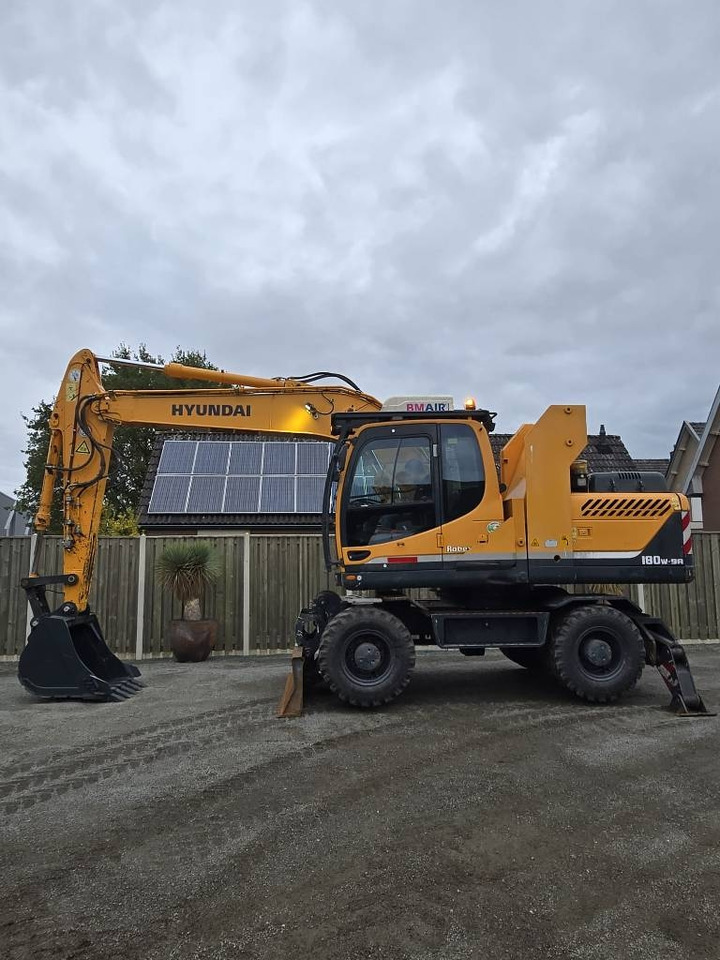 Hyundai R 180W-9A - Mobiele graafmachine: afbeelding 1 Hyundai R 180W-9A - Mobiele graafmachine: afbeelding 1